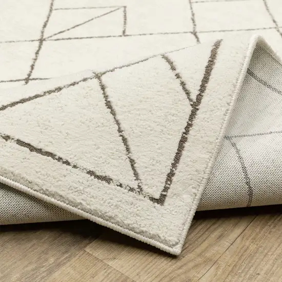 8' Ivory And Taupe Geometric Runner Rug Photo 9