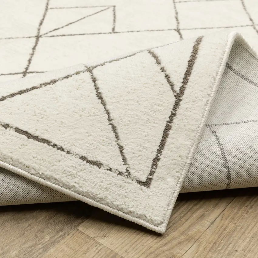 8' Ivory And Taupe Geometric Runner Rug Photo 9