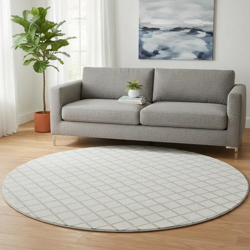8' Ivory And Taupe Geometric Washable Round Rug With UV Protection Photo 1