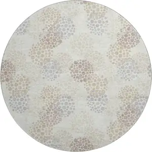 Photo of 8' Ivory And Taupe Polka Dot Washable Round Rug With UV Protection