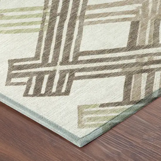 8' Ivory And Taupe Round Geometric Washable Indoor Outdoor Area Rug Photo 6