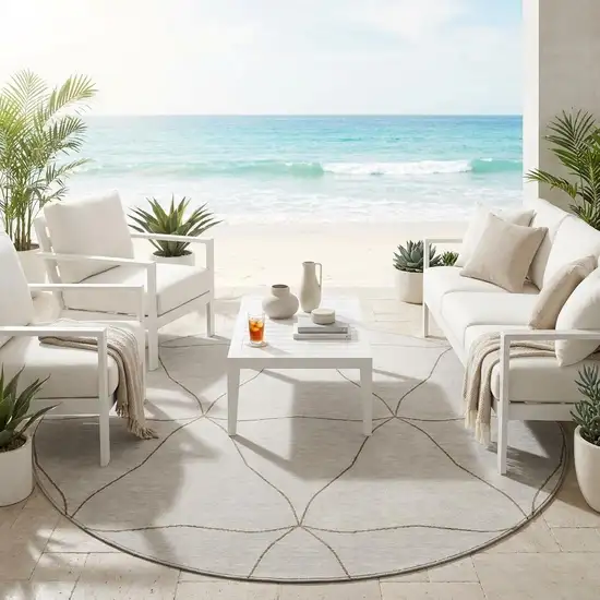8' Ivory And Taupe Round Geometric Washable Indoor Outdoor Area Rug Photo 1