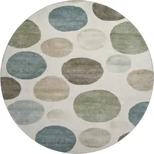Photo of 8' Ivory And Teal Geometric Washable Round Rug With UV Protection