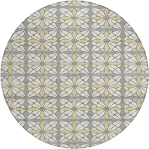 Photo of 8' Ivory And Wheat Round Geometric Washable Indoor Outdoor Area Rug