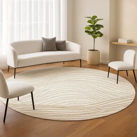 8' Ivory And Wheat Round Striped Washable Indoor Outdoor Area Rug Photo 9