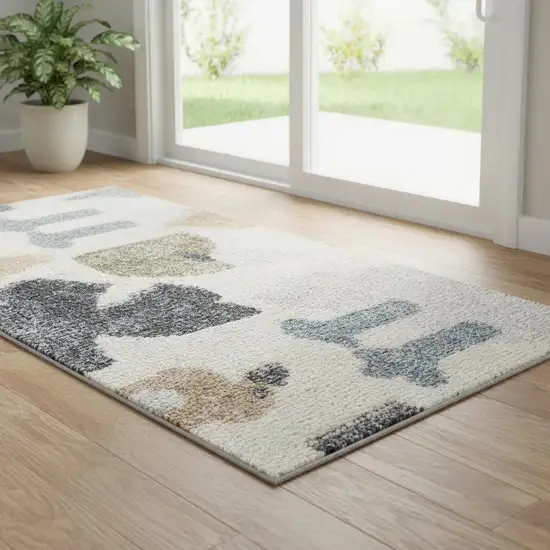 6' Ivory Animal Print Power Loom Runner Rug Photo 1