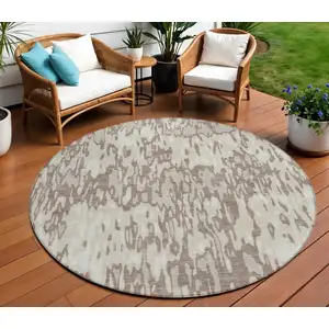 Photo of 8' Ivory Beige And Brown Round Striped Washable Indoor Outdoor Area Rug