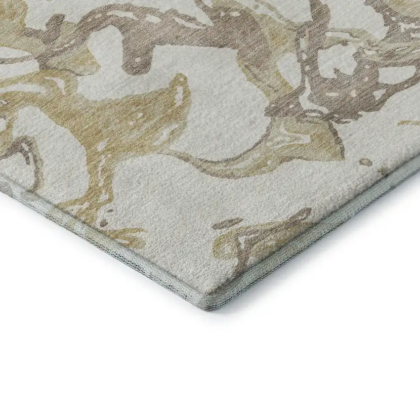 8' Ivory Beige And Gold Abstract Washable Round Rug With UV Protection Photo 6