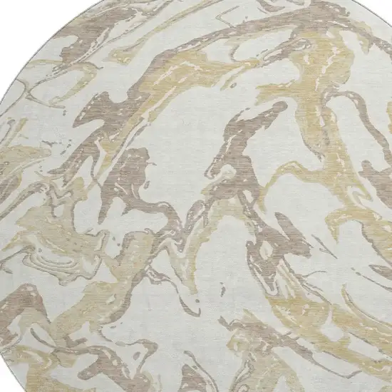 8' Ivory Beige And Gold Abstract Washable Round Rug With UV Protection Photo 2