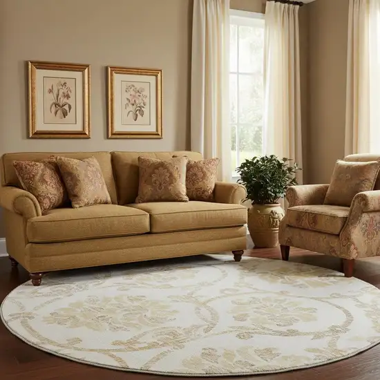 8' Ivory Beige And Gold Floral Washable Round Rug With UV Protection Photo 1