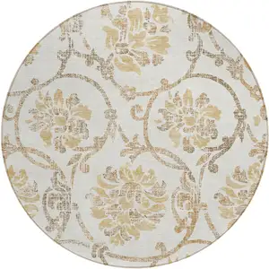 Photo of 8' Ivory Beige And Gold Round Floral Washable Indoor Outdoor Area Rug