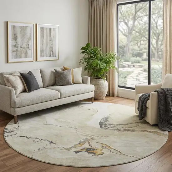 8' Ivory Beige And Gray Abstract Washable Round Rug With UV Protection Photo 1