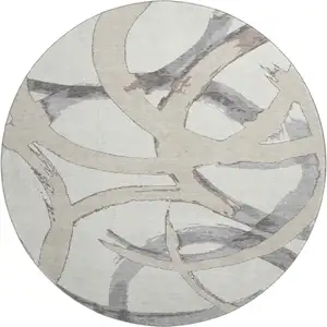 Photo of 8' Ivory Beige And Gray Abstract Washable Round Rug With UV Protection