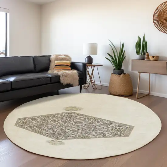 8' Ivory Beige And Gray Oriental Washable Round Rug With UV Protection Photo 4