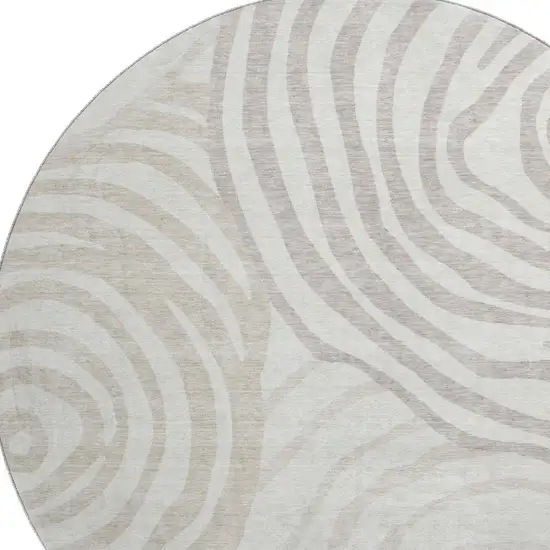 8' Ivory Beige And Khaki Abstract Washable Round Rug With UV Protection Photo 3