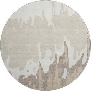 Photo of 8' Ivory Beige And Khaki Abstract Washable Round Rug With UV Protection