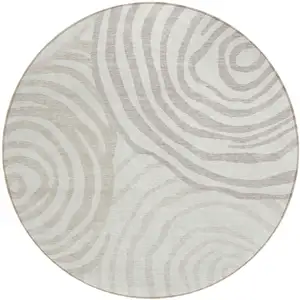 Photo of 8' Ivory Beige And Khaki Round Abstract Washable Indoor Outdoor Area Rug