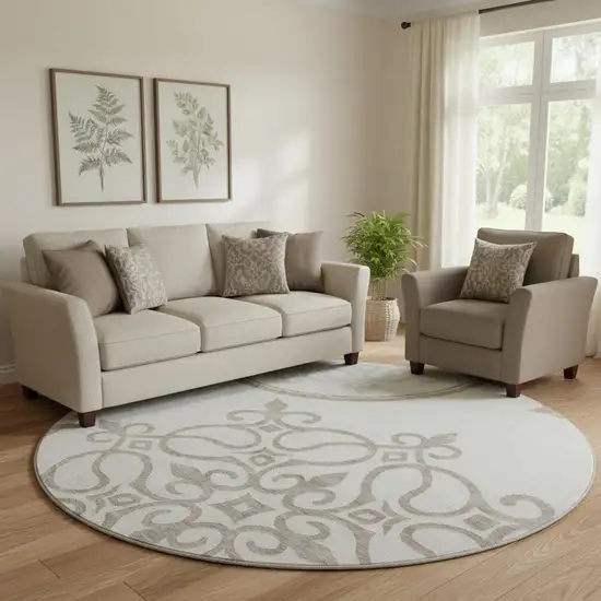 8' Ivory Beige And Tan Floral Medallion Washable Round Rug With UV Protection Photo 1