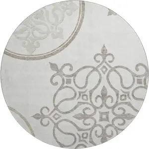 Photo of 8' Ivory Beige And Tan Floral Medallion Washable Round Rug With UV Protection