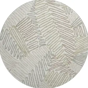 Photo of 8' Ivory Beige And Tan Floral Washable Round Rug With UV Protection