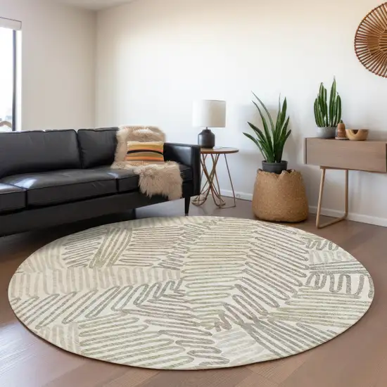 8' Ivory Beige And Tan Floral Washable Round Rug With UV Protection Photo 5