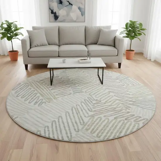 8' Ivory Beige And Tan Floral Washable Round Rug With UV Protection Photo 2