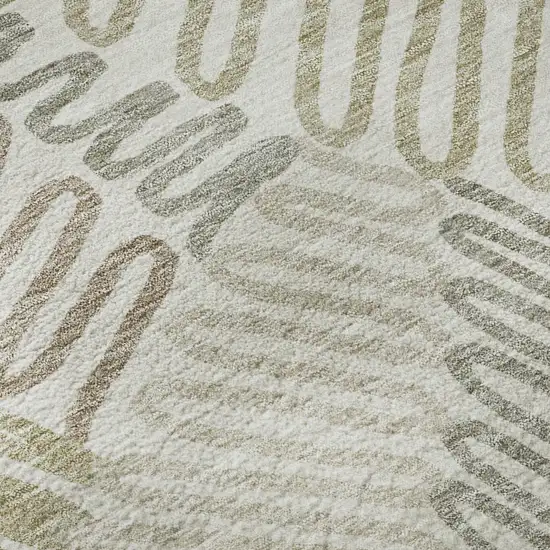 8' Ivory Beige And Tan Floral Washable Round Rug With UV Protection Photo 9