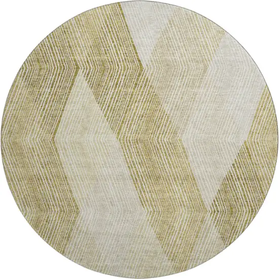 8' Ivory Beige And Tan Geometric Washable Round Rug With UV Protection Photo 1
