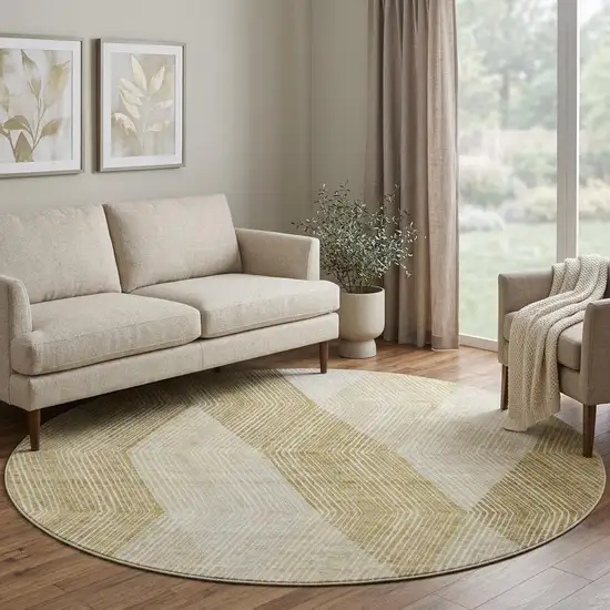 8' Ivory Beige And Tan Geometric Washable Round Rug With UV Protection Photo 1