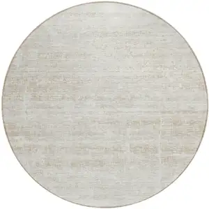 Photo of 8' Ivory Beige And Tan Round Abstract Washable Indoor Outdoor Area Rug
