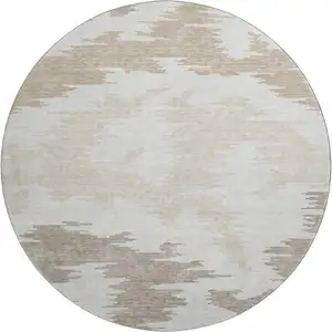 Photo of 8' Ivory Beige And Taupe Abstract Washable Round Rug With UV Protection