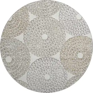 Photo of 8' Ivory Beige And Taupe Geometric Washable Round Rug With UV Protection