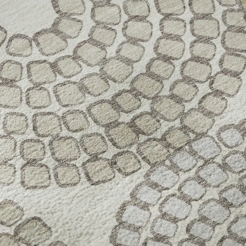 8' Ivory Beige And Taupe Geometric Washable Round Rug With UV Protection Photo 9