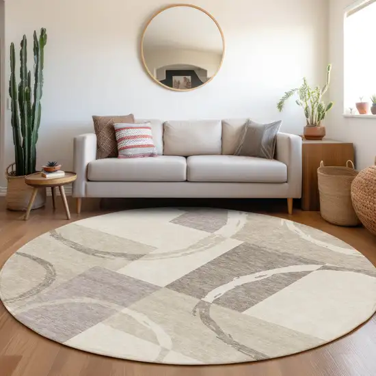 8' Ivory Beige And Taupe Geometric Washable Round Rug With UV Protection Photo 4