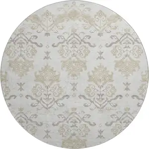 Photo of 8' Ivory Beige And Taupe Medallion Washable Round Rug With UV Protection