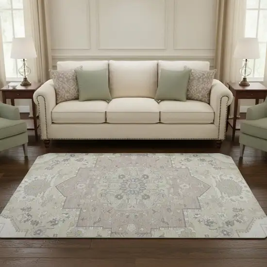 8' Ivory Beige And Taupe Oriental Washable Round Rug With UV Protection Photo 2