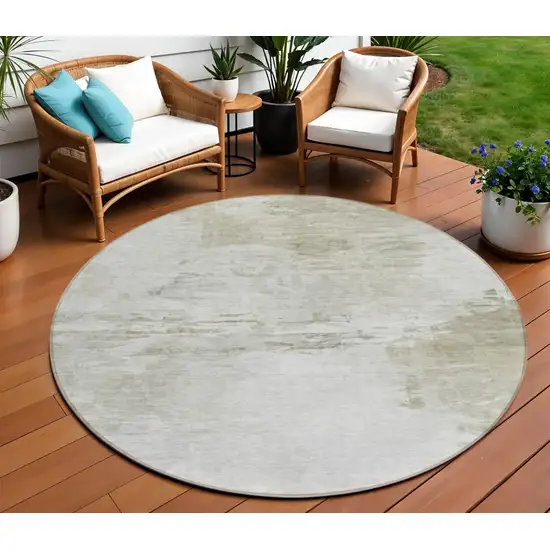 8' Ivory Beige And Taupe Round Abstract Washable Indoor Outdoor Area Rug Photo 1
