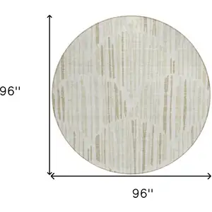 Photo of 8' Ivory Beige And Taupe Round Abstract Washable Indoor Outdoor Area Rug