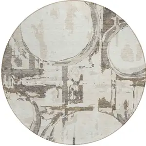 Photo of 8' Ivory Beige And Taupe Round Geometric Washable Indoor Outdoor Area Rug