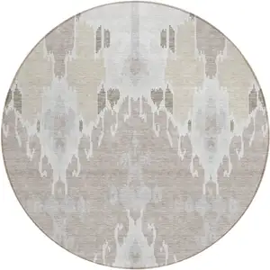 Photo of 8' Ivory Beige And Taupe Round Ikat Washable Indoor Outdoor Area Rug