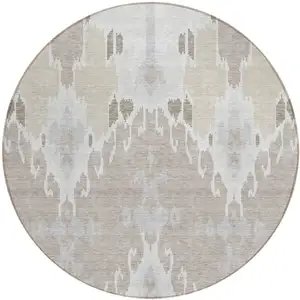 Photo of 8' Ivory Beige And Taupe Round Ikat Washable Indoor Outdoor Area Rug