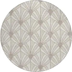 Photo of 8' Ivory Beige And Taupe Round Seashell Washable Indoor Outdoor Area Rug