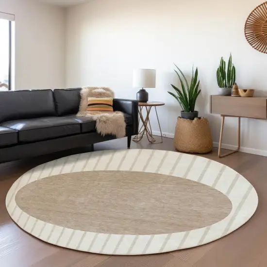 8' Ivory Beige And Taupe Striped Washable Round Rug With UV Protection Photo 4