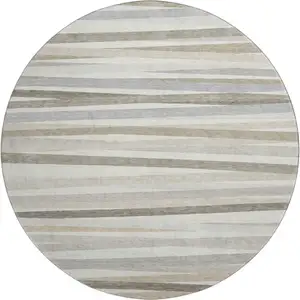 Photo of 8' Ivory Beige And Taupe Striped Washable Round Rug With UV Protection