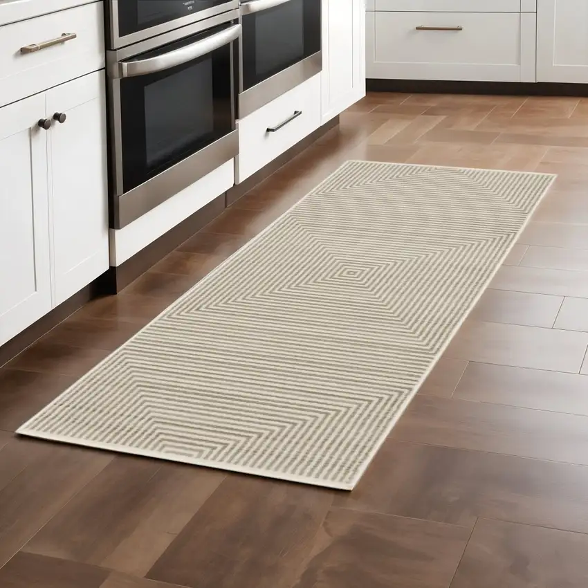 8' Ivory Beige Taupe And Tan Geometric Power Loom Runner Rug With Fringe Photo 1