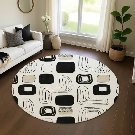 8' Ivory Black And Beige Geometric Washable Round Rug With UV Protection Photo 3