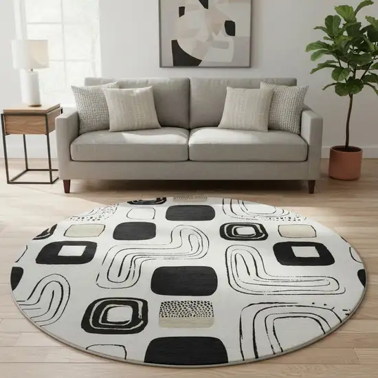 8' Ivory Black And Beige Geometric Washable Round Rug With UV Protection Photo 2