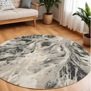 Photo of 8' Ivory Black And Gray Abstract Round Rug