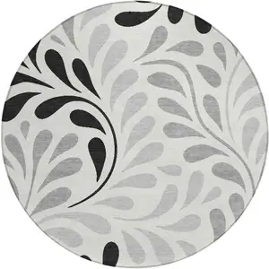 Photo of 8' Ivory Black And Gray Round Botanical Leaves Washable Indoor Outdoor Area Rug