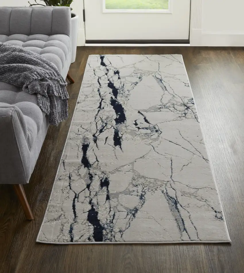8' Ivory Blue And Black Abstract Power Loom Distressed Runner Rug Photo 4
